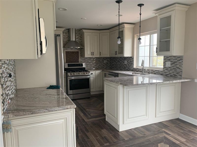 Cream cabinetry granite countertops