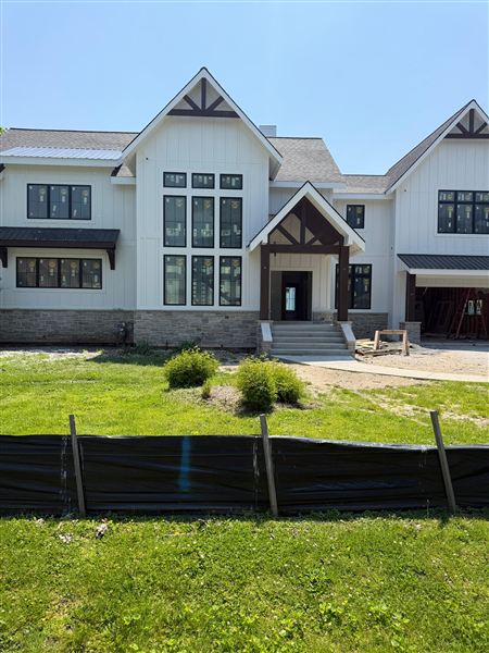White modern farmhouse front exterior