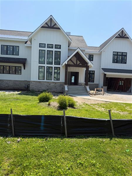 White modern farmhouse stone accent siding